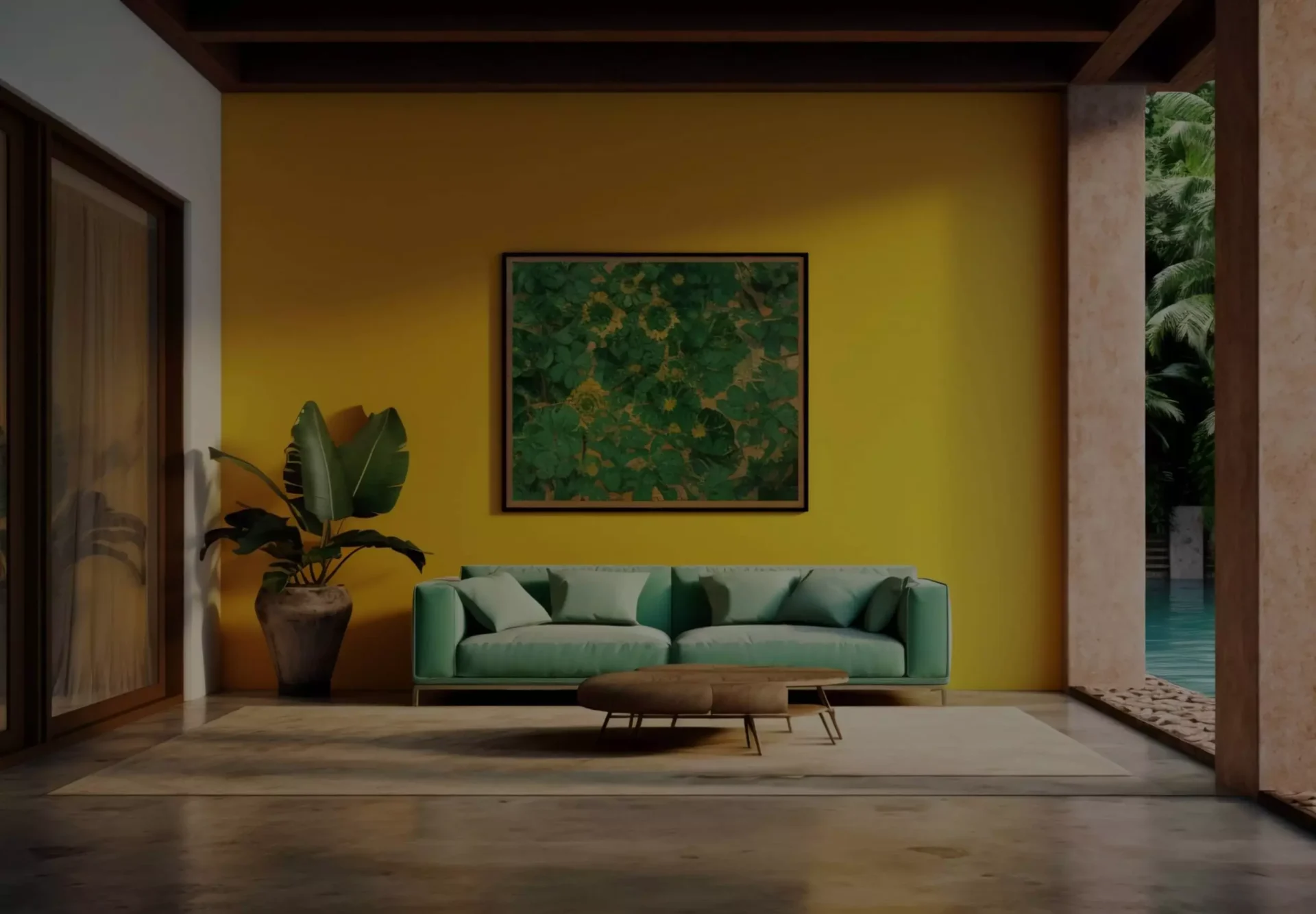 A green couch sitting in front of a yellow wall.